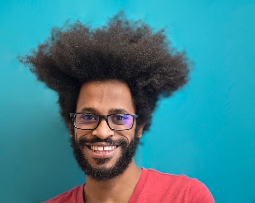 The Legacy of Black Hair Care Innovation: Honoring George E. Johnson Sr. and the Evolution of Natural Hair Products