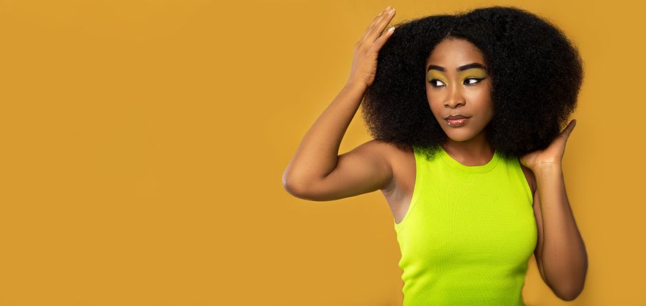 The Legacy of Black Hair Care: Honoring George E. Johnson Sr. and the Modern Natural Hair Movement